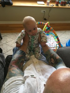 Sitting up, with a little help!