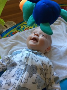 She spends loads of time smiling at her frog! 